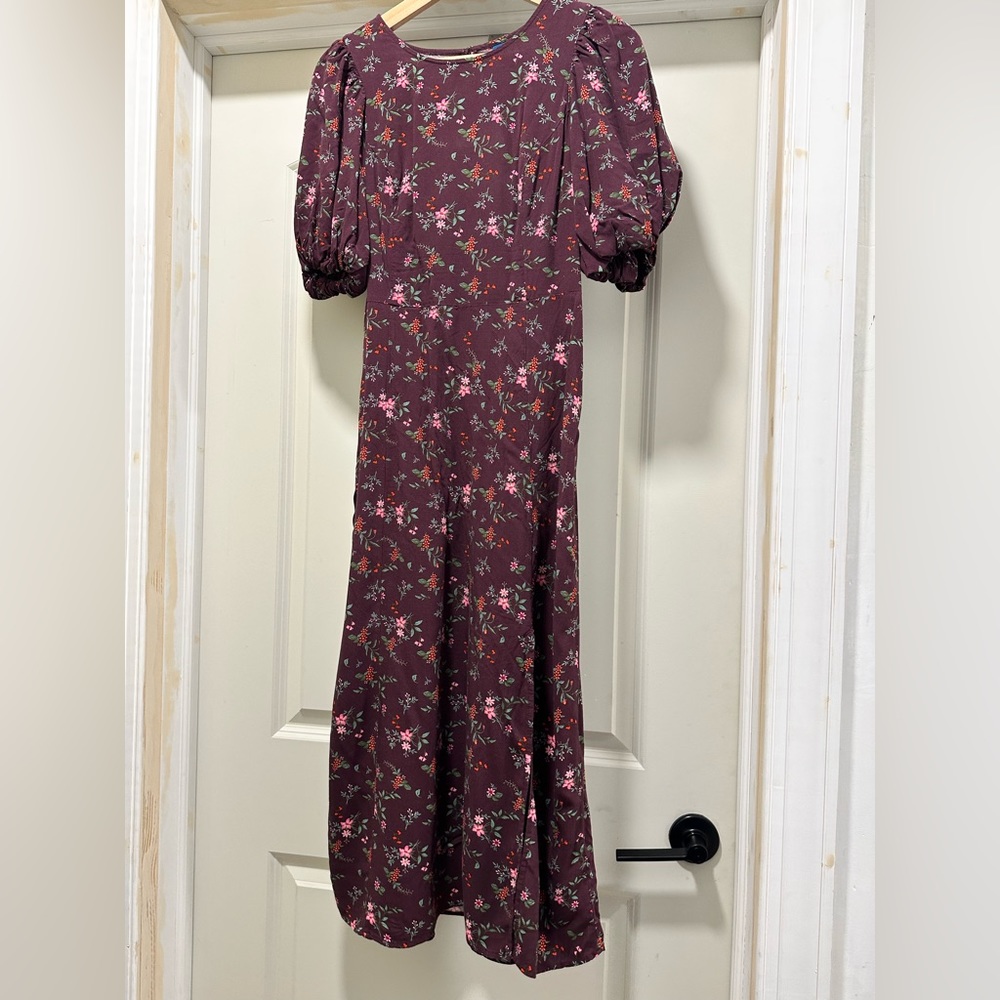 Purple dress with flowers. Side slit detail, cut out back.